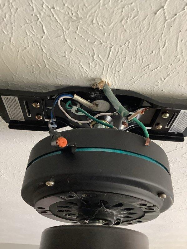 Located and repaired burnt neutral wire in upstairs circuit. Troubleshooting involved inspection of ceiling fan wiring connections and junction box in attic space. Completed repair by replacing damaged section of neutral wire and securing all connections.