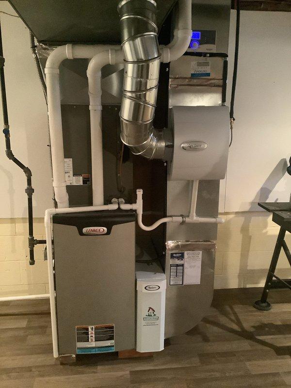 Performed scheduled MVP heating maintenance on Lennox furnace system. Inspected and replaced dirty air filter with new one. Checked all system components, including furnace, humidifier, ductwork, and condensate drain lines, confirming proper operation for the heating season.