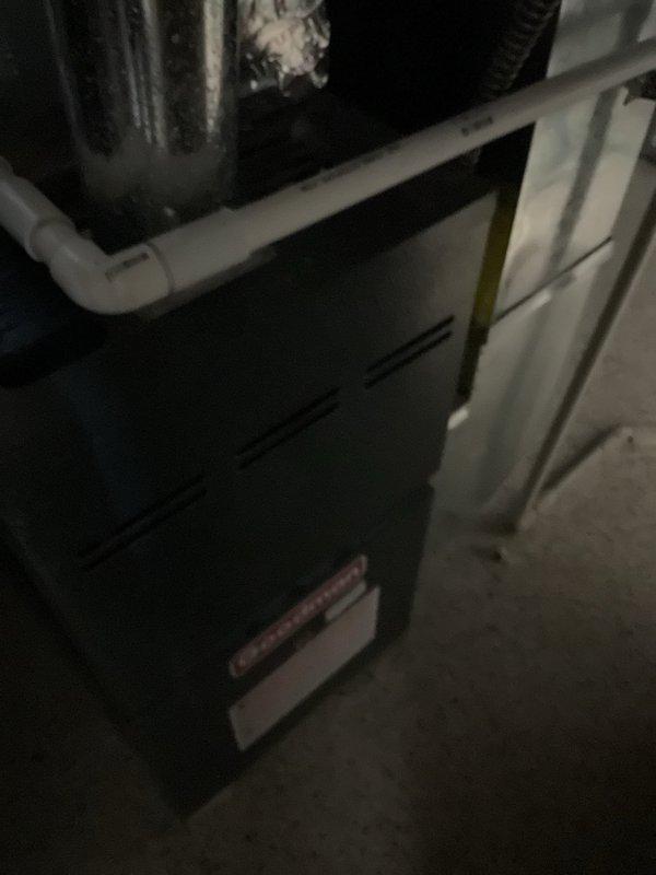 Performed routine maintenance on 9-year-old Goodman furnace system. Conducted comprehensive inspection of unit, verifying proper installation of PVC venting and ductwork connections. System appears to be functioning normally with no signs of damage or leakage.