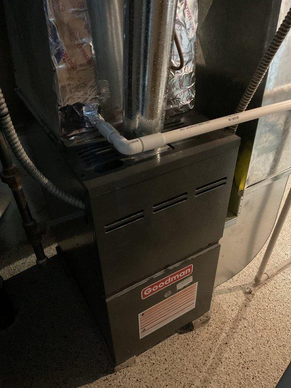 Performed routine maintenance on 9-year-old Goodman furnace system. Conducted comprehensive inspection of unit, verifying proper installation of PVC venting and ductwork connections. System appears to be functioning normally with no signs of damage or leakage.