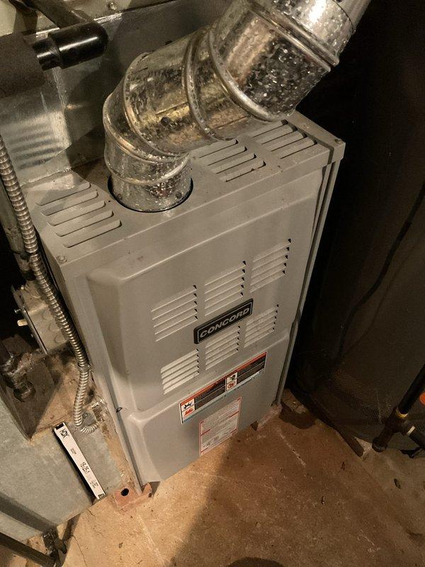 Responded to no-heat complaint on Concord furnace less than 10 years old. Diagnostic inspection revealed dual run capacitor failure causing improper operation despite system activation. Replaced faulty capacitor, tested system operation through complete heating cycle, and verified proper airflow through ductwork. System now functioning normally with proper ignition and heat distribution.