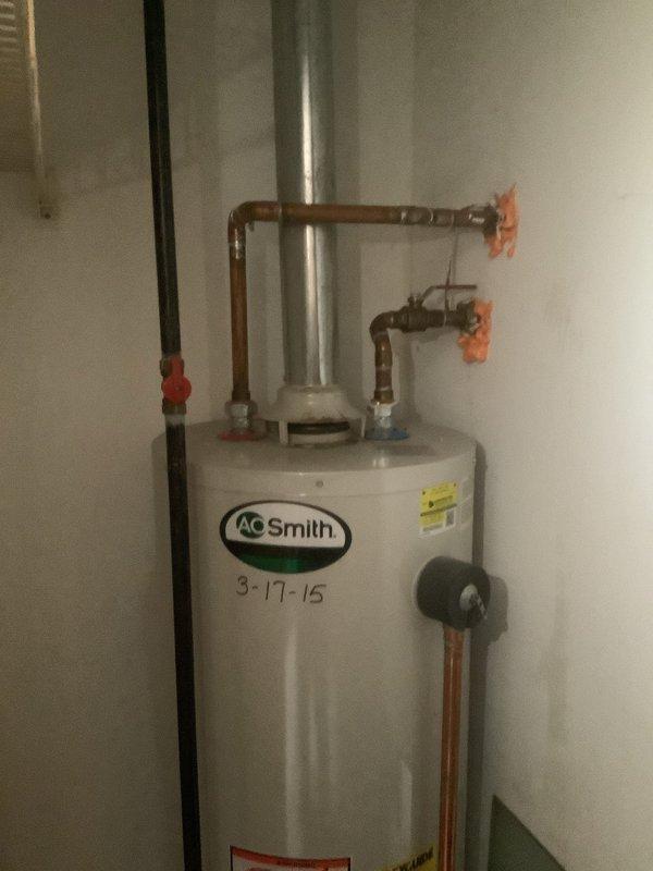 Performed routine maintenance flush on an A.O. Smith tanked water heater (installed 3-17-15) that customer reported making intermittent noises. Drained sediment from tank, inspected all connections and valves for proper operation. System is functioning correctly with no leaks detected in supply lines or at temperature/pressure relief valve. Recommended continued annual maintenance to extend unit lifespan.