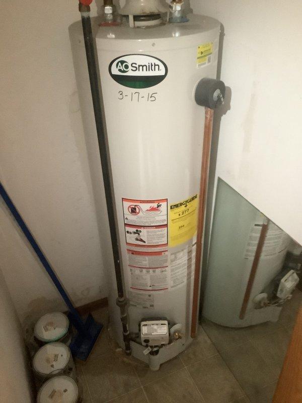 Performed routine maintenance flush on an A.O. Smith tanked water heater (installed 3-17-15) that customer reported making intermittent noises. Drained sediment from tank, inspected all connections and valves for proper operation. System is functioning correctly with no leaks detected in supply lines or at temperature/pressure relief valve. Recommended continued annual maintenance to extend unit lifespan.