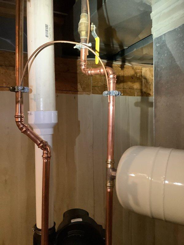 Successfully completed installation of 50-gallon power vent MVP water heater per customer's request. Installed new copper supply and return lines with appropriate fittings, and mounted expansion tank to wall. All connections were properly secured with metal clamps and the system was tested for proper operation.
