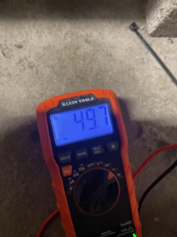 Completed routine maintenance on a 2-year-old furnace previously installed by Blind and Sons. Performed comprehensive diagnostic testing using multimeter readings (15.13 and 49.7) to verify proper electrical operation and system functionality. All systems operating within manufacturer specifications after tune-up.