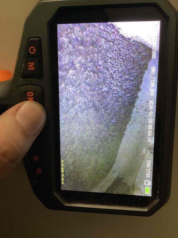 Performed diagnostic assessment on customer's aging gas furnace experiencing water infiltration issues. Used thermal imaging equipment to identify moisture intrusion pathways through the unit. Documentation and visual evidence collected to support findings of water damage affecting furnace operation.