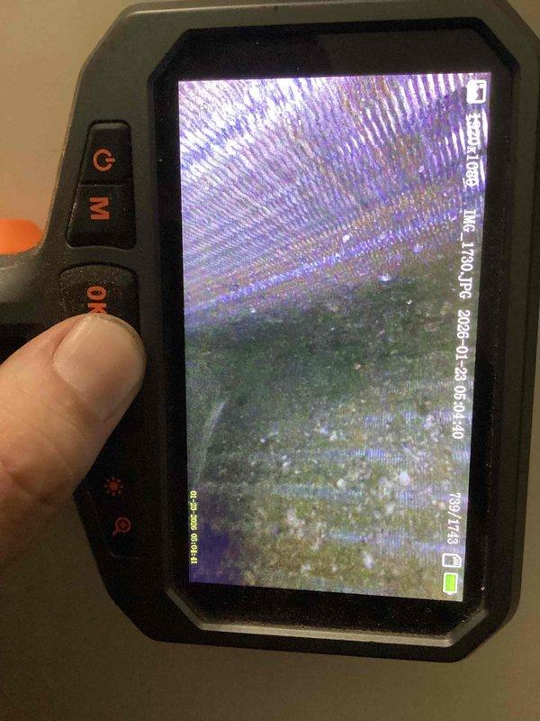Performed diagnostic assessment on customer's aging gas furnace experiencing water infiltration issues. Used thermal imaging equipment to identify moisture intrusion pathways through the unit. Documentation and visual evidence collected to support findings of water damage affecting furnace operation.