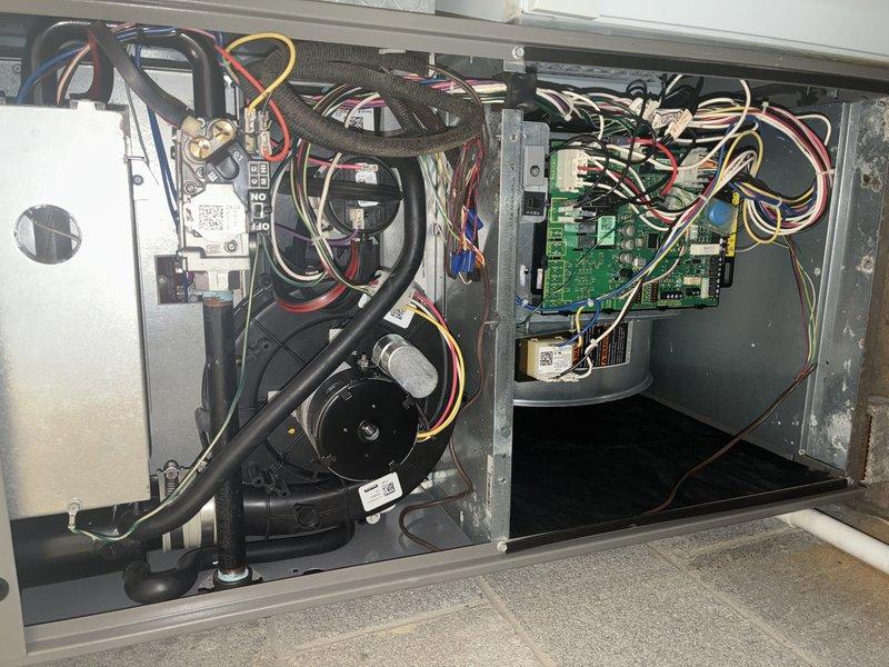 Performed annual maintenance on 6-year-old furnace. Inspected and replaced air filter with new pleated filter to ensure proper airflow. Examined control board and wiring connections in electrical panel, confirming all components are securely connected and functioning correctly.