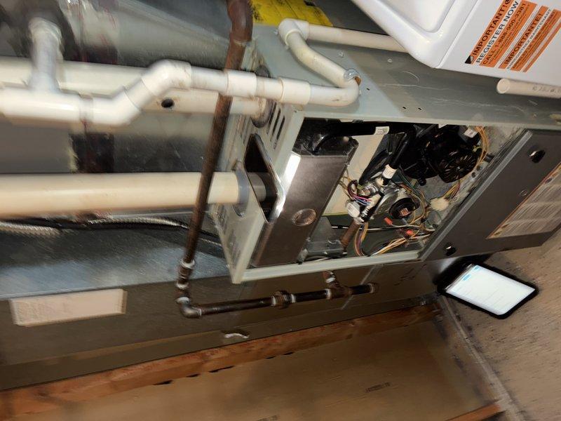 Responded to urgent no-heat call for 15-year-old furnace system. Diagnostic inspection revealed severely clogged cooling coils with extensive dust and debris accumulation, significantly reducing system efficiency. Performed thorough cleaning of heat exchanger components and verified proper operation of system after service, restoring heat functionality.
