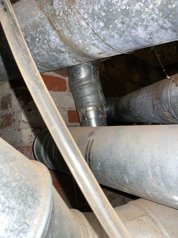 Responded to no heat call for 24+ year old Bryant furnace with pilot light issues. Upon inspection, determined the furnace required manual lighting for operation each time heat was needed. System showed significant age-related wear on ductwork and blower assembly components. Recommended replacement due to equipment age and chronic ignition problems.