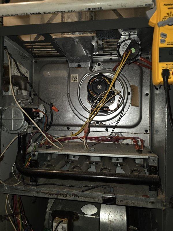 Responded to no heat call where furnace blower was running but flames would not ignite. Diagnostic inspection revealed deteriorated flexible ductwork connections and performed electrical testing on blower motor assembly. Traced issue to faulty ignition system and restored proper heating function.