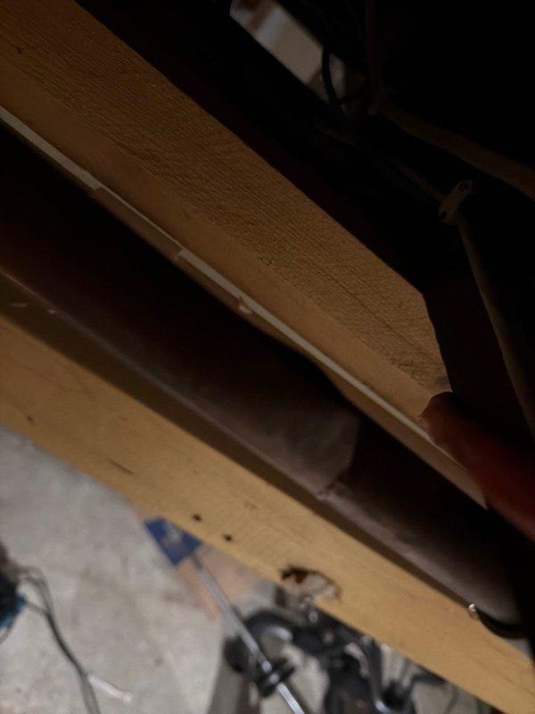 Conducted follow-up inspection after restoration company exposed plumbing in ceiling area as previously requested. Assessed water supply issue by examining exposed copper supply lines and PVC drainage pipes between structural joists. Documented current condition with photos for repair planning through customer's MVP repair discount program.