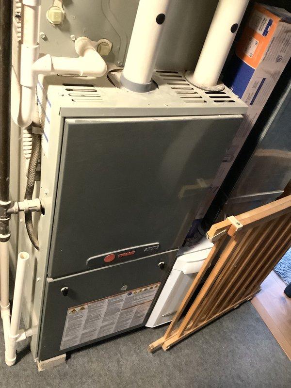 Performed inspection of 13-year-old furnace system and identified cracked heat exchanger requiring full replacement. Documented existing installation configuration including ventilation, water heater proximity, and current ducting layout. Prepared comprehensive replacement estimate for customer review.