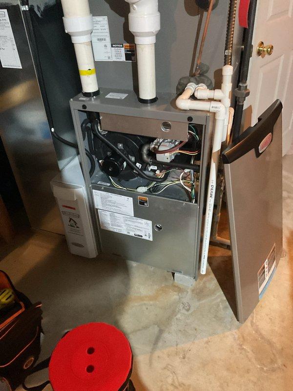 Responded to emergency service call for 4-year-old furnace overheating and triggering smoke alarms during extreme cold weather. Upon inspection, confirmed customer's report of a hole in the heat exchanger, which was previously identified by another technician. Performed comprehensive diagnostic of internal components including motor assembly, ventilation system, and electrical connections to verify the extent of damage.