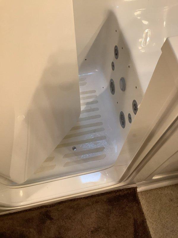 Replaced damaged tub handle in customer's walk-in shower. Inspected drain and jetted tub components to ensure proper functionality. All fixtures now operating correctly with no leaks observed during testing.