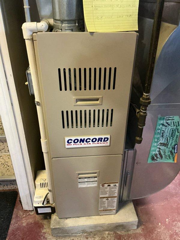 Conducted assessment of existing Concord 90 Plus gas furnace system in utility room for potential replacement. Documented current installation conditions including ventilation, mounting, and connections. Prepared estimate for furnace replacement with detailed specifications noted on service documents.