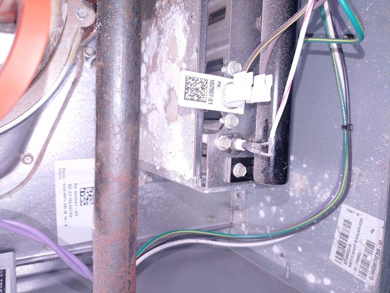 Responded to call for furnace not maintaining temperature (set at 75° but only reaching 66°). Inspected blower wheel assembly and found significant dust accumulation affecting airflow. Examined control board and flame sensor connections which showed corrosion on nearby components. Cleaned blower wheel, verified proper sensor operation, and restored system to normal function with proper temperature maintenance.