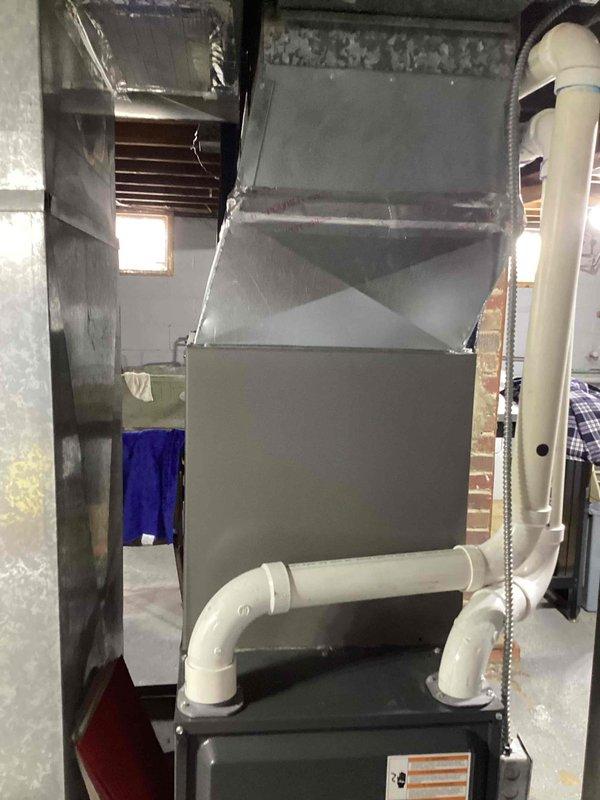 Performed diagnostic assessment on 9-year-old Franklin gas furnace reporting no heat issues. Visual inspection revealed properly installed system with intact ventilation components. Customer has secondary heat options available; service appointment rescheduled for Tuesday for comprehensive repair.