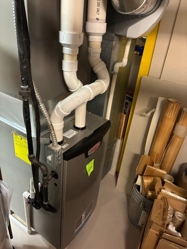 Completed scheduled MVP heating maintenance service that was rescheduled from previous date. Performed inspection of residential furnace system, examining connections and verifying proper installation of PVC condensate drainage lines. Utilized specialized tool to check critical components and ensure system functionality for the heating season.