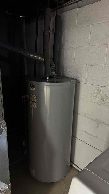 Performed routine furnace tune-up as scheduled. Inspected control board and electrical connections, confirming proper functionality of all circuits and wiring harnesses. Noted water heater showing signs of moisture damage on adjacent wall, which may require future attention but is not affecting furnace operation.