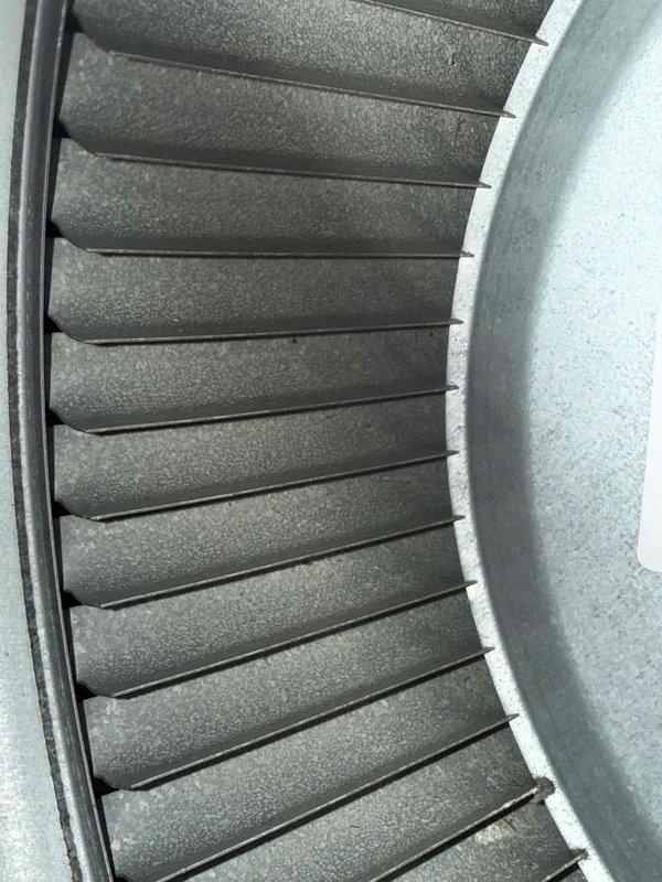 Performed scheduled maintenance on two furnace units. Inspected blower wheel assembly which appeared functional with minor dust accumulation. Noted significant corrosion and water damage at the base of water heater with visible rust/mineral buildup where unit meets the floor, suggesting potential moisture issues that should be monitored.