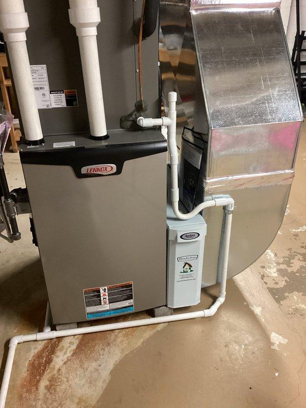 Performed scheduled maintenance on Lennox furnace system. Inspected air filter, found it clean and in good condition. Checked PVC exhaust/intake pipes, ductwork connections, and condensate drainage system - all components functioning properly with no issues detected.