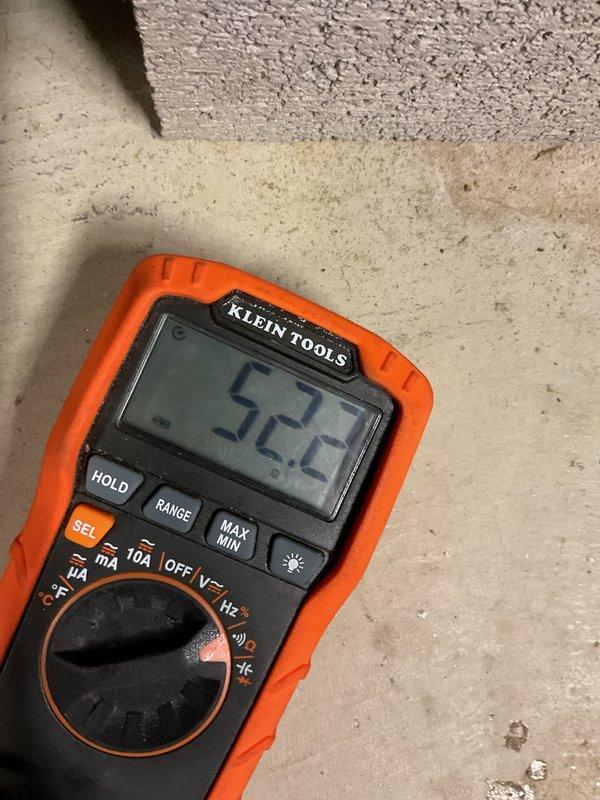 Performed scheduled MVP heating maintenance visit and connected customer's humidifier as previously requested by customer at installation. Conducted electrical measurements with digital multimeter to verify proper voltage readings (52.2V). Used hex key to access and service equipment components as part of comprehensive heating system inspection.