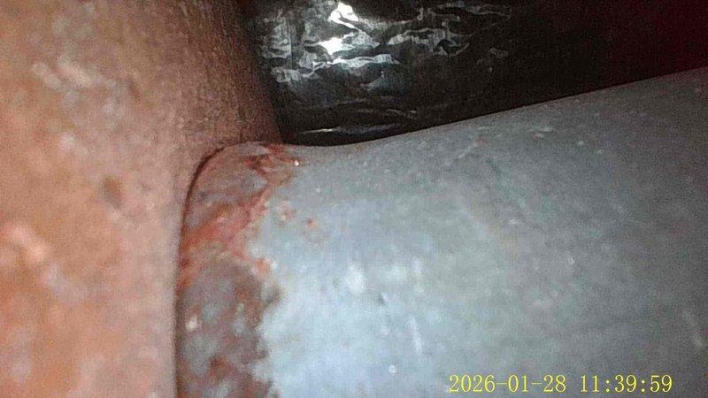 Diagnosed no heat issue in 30-year-old heating system. Inspection revealed significant corrosion at critical junction points, with visible deterioration of metal components. Performed temporary repair to restore heat function while recommending system replacement due to age and extensive component degradation.