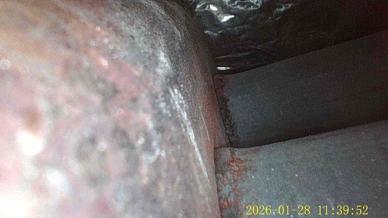 Diagnosed no heat issue in 30-year-old heating system. Inspection revealed significant corrosion at critical junction points, with visible deterioration of metal components. Performed temporary repair to restore heat function while recommending system replacement due to age and extensive component degradation.