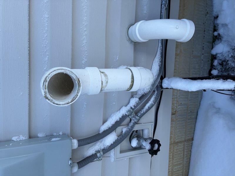 Responded to recurring issue previously serviced by Frank. Observed significant frost buildup around exhaust pipe connection to furnace. Identified frozen condensate drain line with ice formation at exterior wall penetration due to extreme cold temperatures, causing system malfunction. Cleared ice blockage and insulated exterior piping to prevent future freezing.