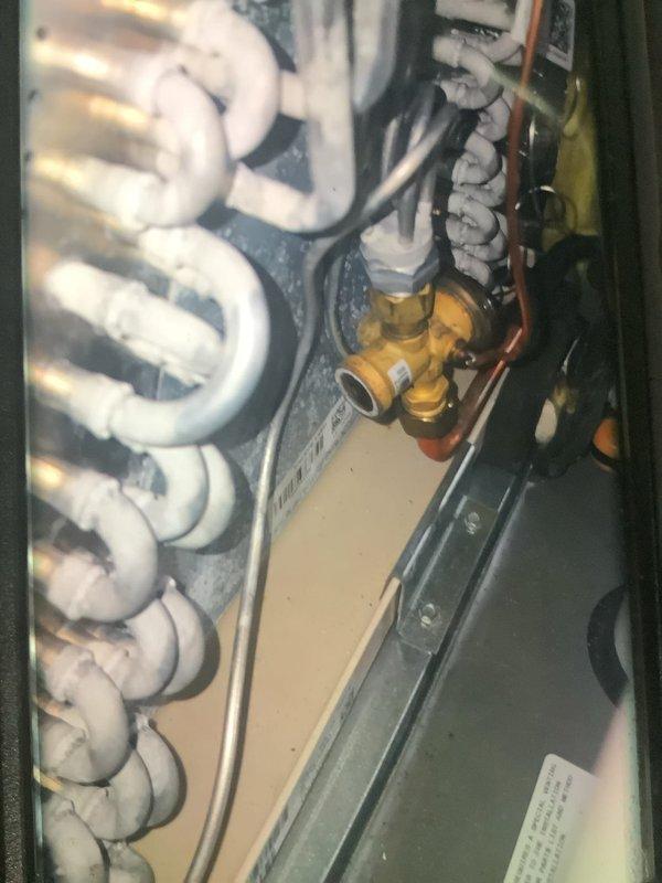 Performed MVP heating maintenance service with comprehensive system diagnostics. Conducted static pressure measurements using UEi EM201B device (reading 36.98), and inspected evaporator coils which showed normal frost pattern with minor dust accumulation. System connections and wiring were verified intact with no issues detected.