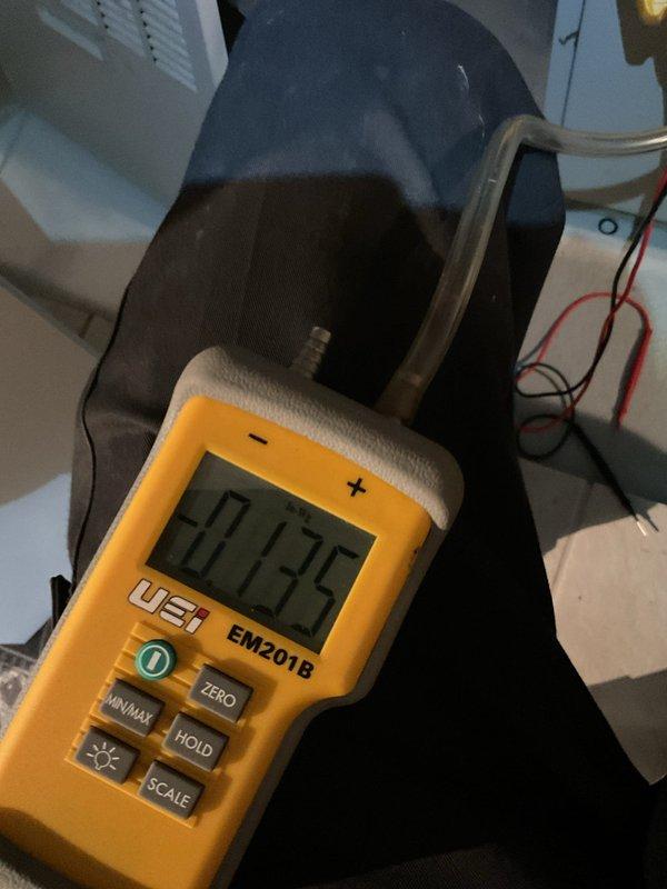 Diagnosed 15-year-old furnace with no heat complaint and loud motor noise. Testing revealed a failed blower motor drawing 0.135 amps (significantly below normal operating range). Replaced blower motor assembly and verified proper system operation with normal temperature rise across heat exchanger.