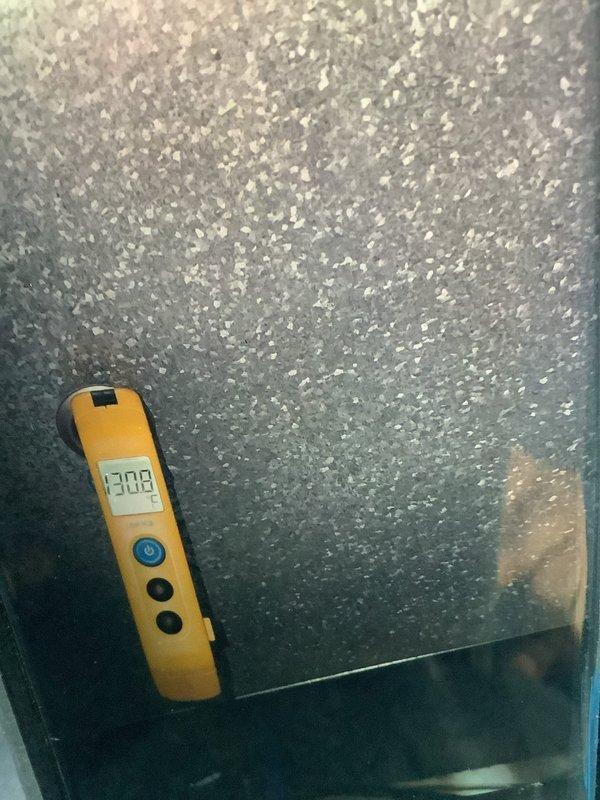 Diagnosed heating system failure caused by faulty flame sensor. Performed thorough system inspection, took temperature readings showing inadequate heat output (30.8°), and cleaned corroded flame sensor to restore proper ignition sequence. Unit now functioning correctly with consistent flame detection and proper heat output.