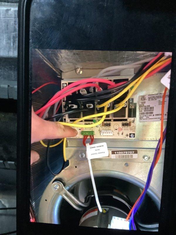 Diagnosed 4-month-old geothermal unit with auxiliary heat failure. Inspected control board connections and identified loose yellow wires at the auxiliary heat terminals. Secured connections and verified proper operation of auxiliary heating elements.