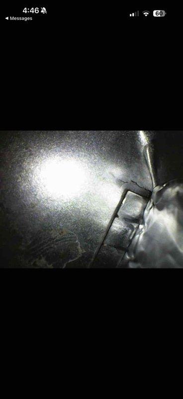 Responded to customer complaint of system blowing cold air despite being in heating mode. Inspection revealed significant dust and debris accumulation on evaporator coil fins, restricting proper airflow. Performed thorough cleaning of coil assembly to restore proper heat transfer and system efficiency.