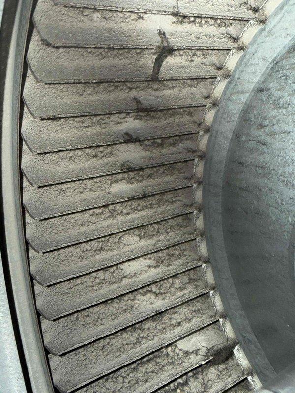 Responded to customer complaint of system blowing cold air despite being in heating mode. Inspection revealed significant dust and debris accumulation on evaporator coil fins, restricting proper airflow. Performed thorough cleaning of coil assembly to restore proper heat transfer and system efficiency.