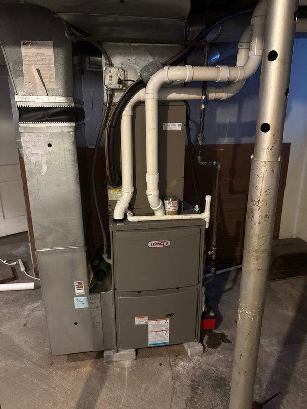 Successfully completed installation of a 90% efficient Lennox furnace with proper PVC venting. System was properly connected to the existing ductwork and all connections were tested for proper operation. Exterior venting was confirmed to be exhausting correctly with visible vapor discharge.