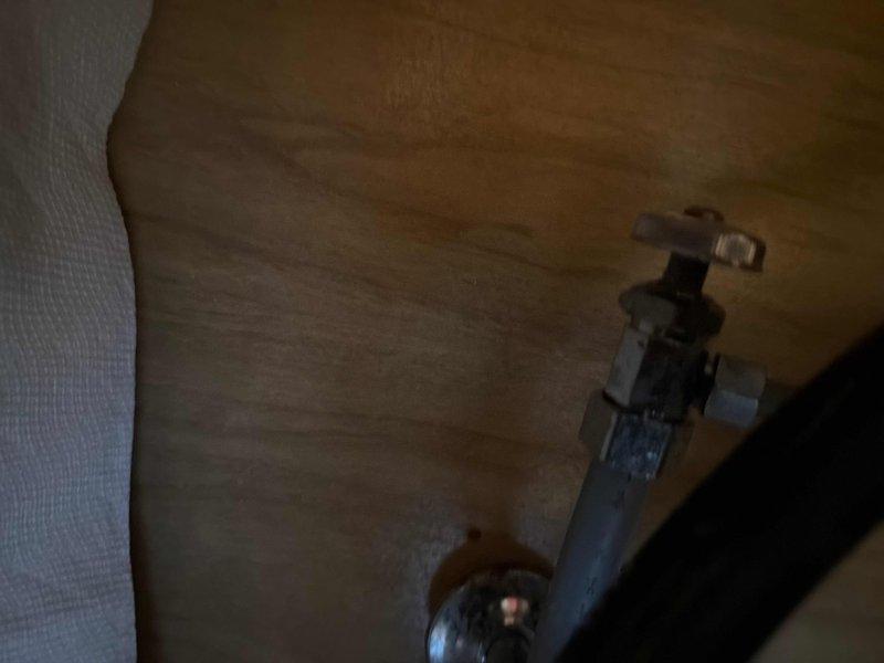 Responded to a customer complaint regarding water leak beneath kitchen sink. Upon inspection, identified the source of the leak at the dishwasher connection point. Tightened the loose fittings on the drain assembly and verified the disposal was properly sealed. Tested water flow and confirmed resolution with no further leakage present.