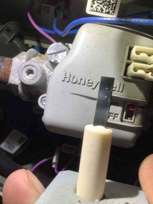 Performed scheduled MVP heating maintenance service on 6-year-old system. Inspected Honeywell control module, tested ON/OFF switch functionality, and verified proper wire connections. Cleaned dust accumulation from control housing to ensure optimal operation.