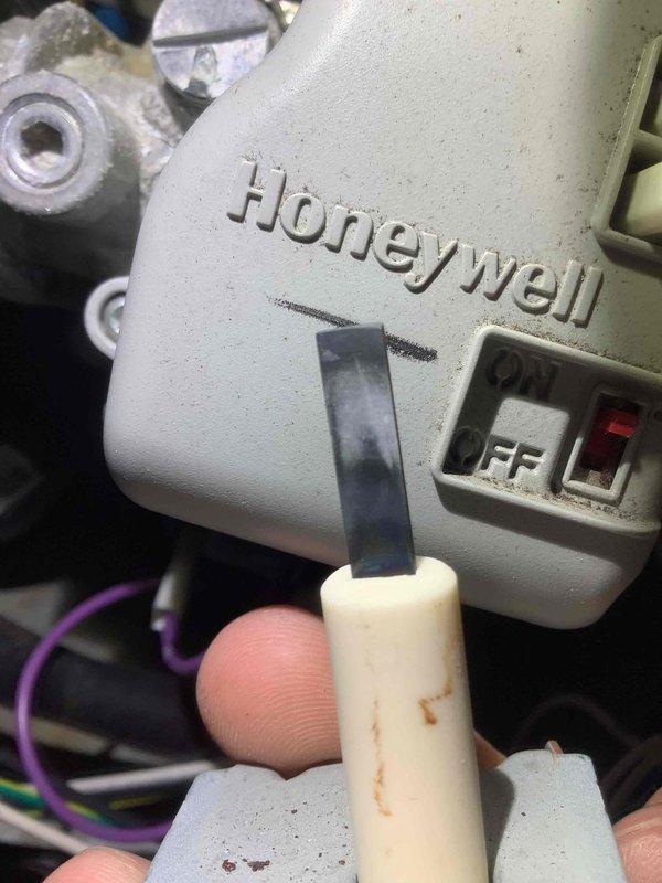 Performed scheduled MVP heating maintenance service on 6-year-old system. Inspected Honeywell control module, tested ON/OFF switch functionality, and verified proper wire connections. Cleaned dust accumulation from control housing to ensure optimal operation.