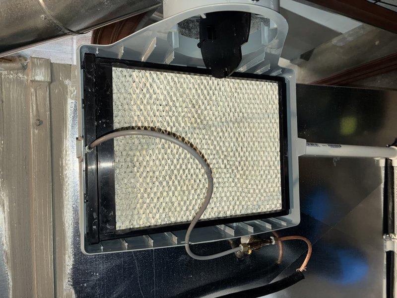 Performed routine maintenance on 5-year-old furnace. Inspected humidifier system and verified proper water supply connection to pad. Replaced air filter with clean pleated filter to ensure optimal system performance and air quality.