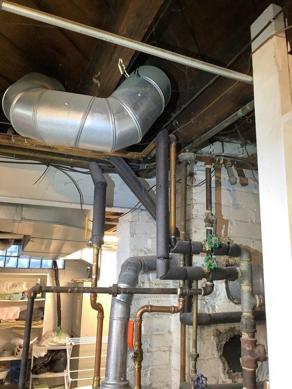 Performed annual boiler maintenance service on a functioning system prior to customer's extended absence. Inspected all plumbing connections, PVC venting system, and metal ductwork. Verified proper operation of valves and fittings throughout the heating system, with all components found to be in good working order.