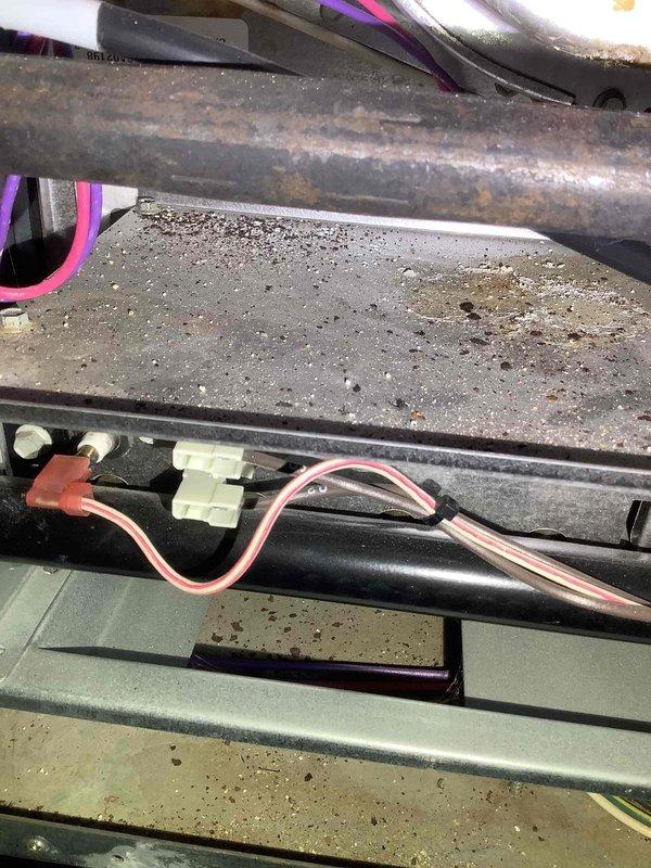 Completed scheduled heating maintenance service on 6-year-old system. Observed significant dust and debris accumulation on pleated air filter requiring replacement. Noted rust formation on internal components and dust buildup on electrical connections, indicating need for thorough cleaning to maintain system efficiency and prevent potential component failure.