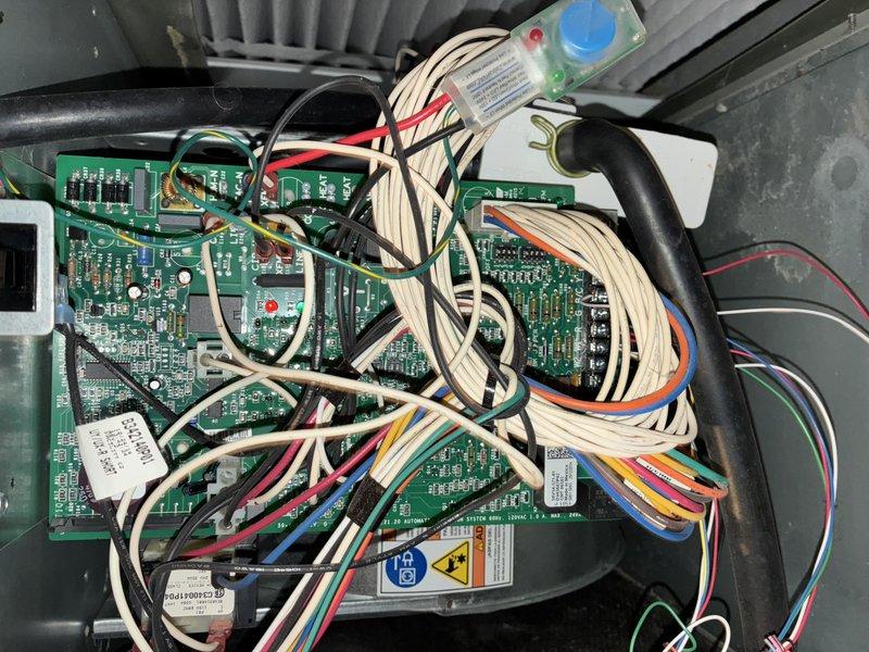 Performed comprehensive furnace tune-up including inspection of the air filtration system which was found to be in good condition with no visible dust accumulation or damage. Conducted thorough examination of the control board and electrical connections, verifying proper wire routing and component functionality with no issues detected in the circuit board or associated wiring harnesses.