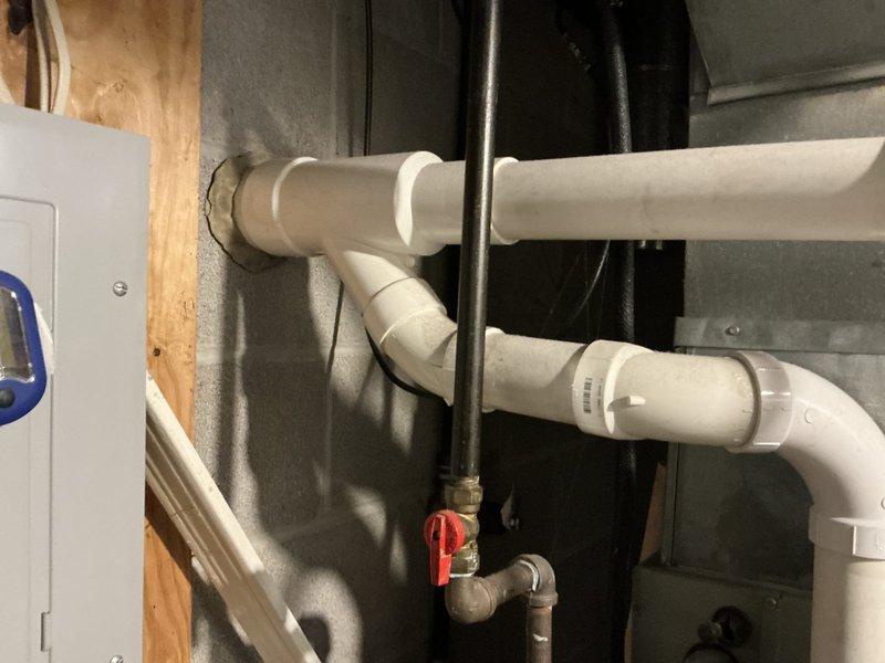 Performed diagnostic inspection of 13-year-old furnace, confirming cracked heat exchanger and failure of second-stage operation. Documented existing HVAC system components and plumbing configuration. Provided replacement estimate for new unit with Lord rebate eligibility.