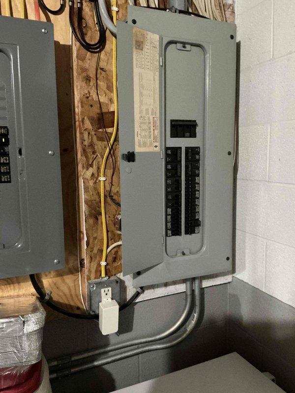 Conducted site assessment for mini split installation in sunroom, including evaluation of existing electrical panel capacity and exterior wall configuration for potential line set routing. Documented current electrical infrastructure and window/exterior wall positioning to determine optimal placement for indoor and outdoor units.