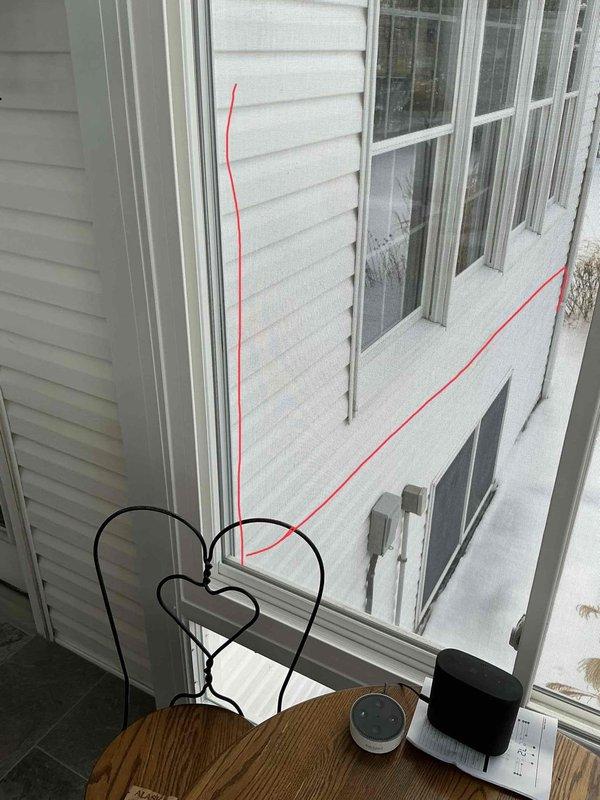 Conducted site assessment for mini split installation in sunroom, including evaluation of existing electrical panel capacity and exterior wall configuration for potential line set routing. Documented current electrical infrastructure and window/exterior wall positioning to determine optimal placement for indoor and outdoor units.