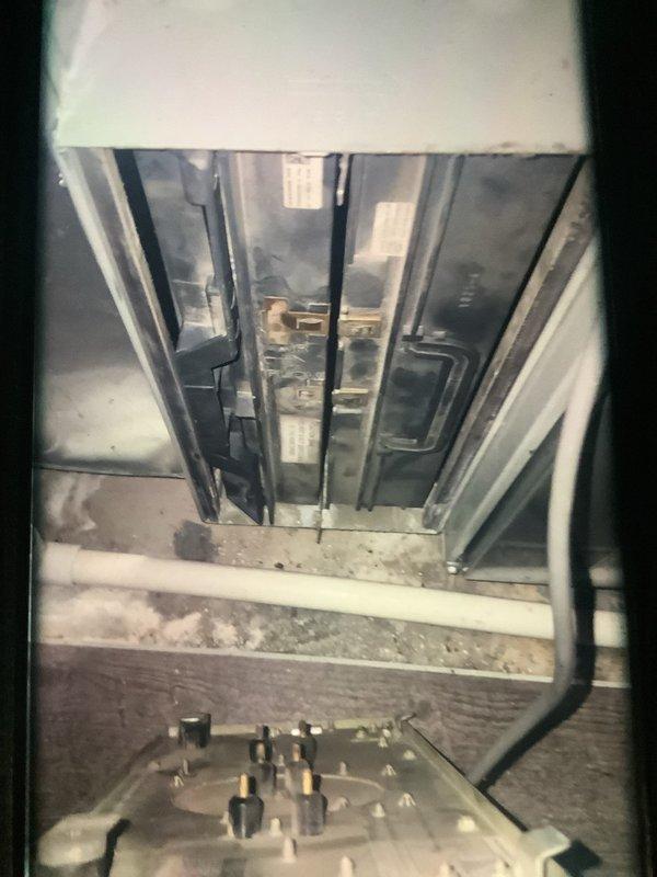 Performed routine tune-up on customer's aging furnace (>10 years old). Inspection revealed significant dust/debris accumulation in heat exchanger fins and junction areas. Cleaned accessible components and verified system operation. Recommended regular maintenance schedule to extend equipment lifespan.