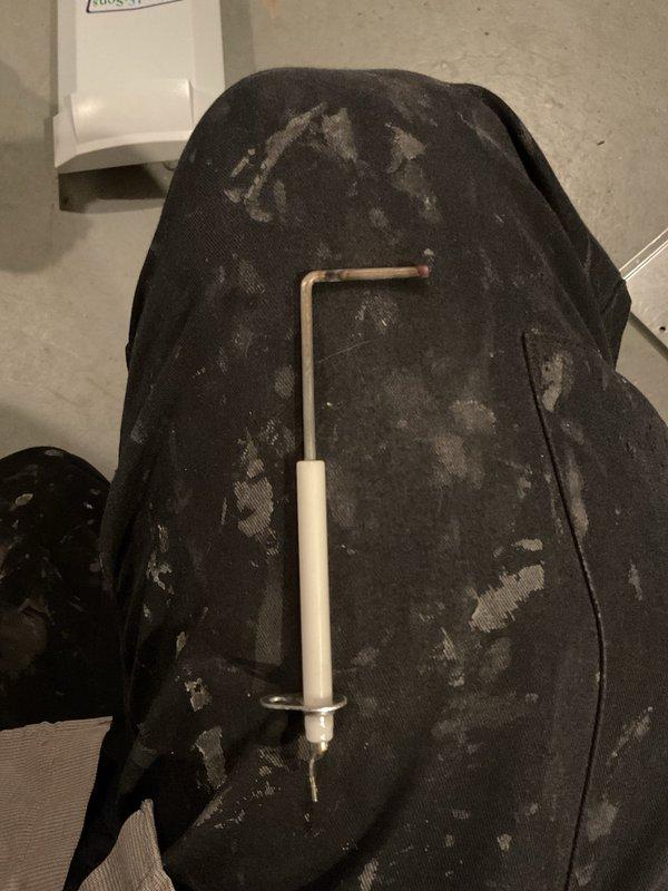 Performed routine maintenance on heating system. Inspected and replaced air filter which showed significant dust accumulation. Used hex key tool to access system components and complete standard maintenance procedures.