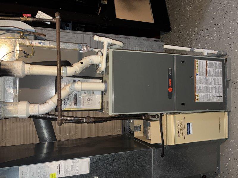 Performed routine tune-up service on 9-year-old Trane furnace. Inspected system components including heat exchanger, burners, and gas line connections. Replaced dirty air filter with new one to improve system efficiency and air quality. All systems functioning properly with no safety concerns noted.